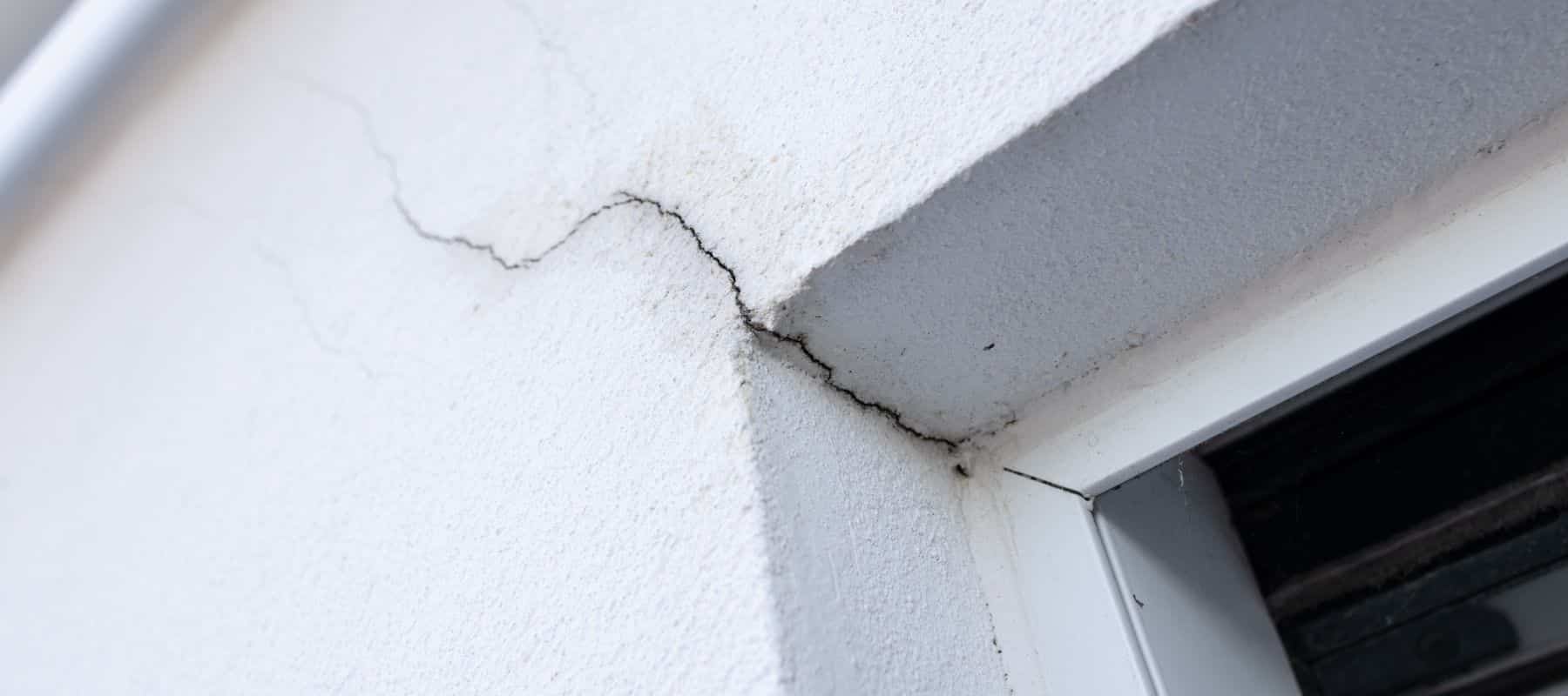 large crack in stucco exterior